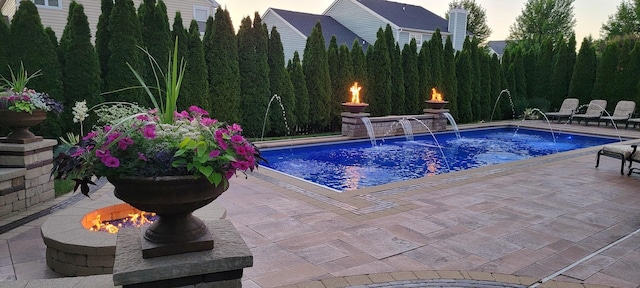 3004 Wayland Ave, Elgin, IL 60124 - outdoor pool featuring a patio and a fire pit