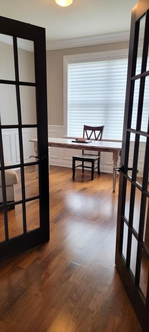 3004 Wayland Ave, Elgin, IL 60124 - hall featuring ornamental molding, dark wood finished floors, a wainscoted wall, and a decorative wall