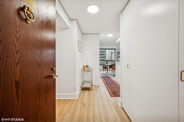 440 N Wabash Ave Unit 1908, Chicago, IL 60611 - corridor featuring light wood-type flooring and baseboards