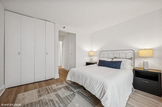 440 N Wabash Ave Unit 1908, Chicago, IL 60611 - bedroom featuring wood finished floors and a closet
