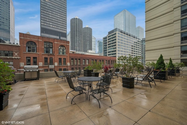 440 N Wabash Ave Unit 1908, Chicago, IL 60611 - view of patio / terrace featuring a skyline view and grilling area