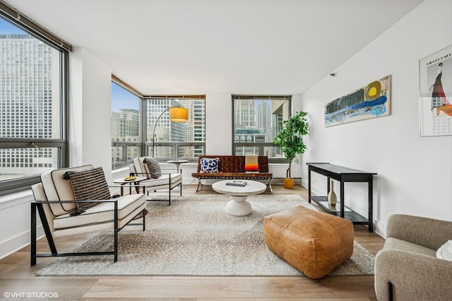 440 N Wabash Ave Unit 1908, Chicago, IL 60611 - living area featuring wood finished floors, healthy amount of natural light, and a city view