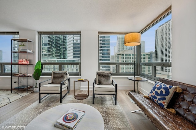 440 N Wabash Ave Unit 1908, Chicago, IL 60611 - living area with wood finished floors and a city view