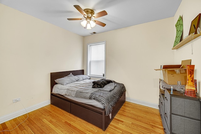 4825 N Karlov Ave, Chicago, IL 60630 - bedroom with light wood-type flooring and ceiling fan