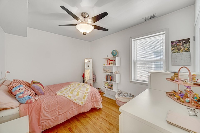 4825 N Karlov Ave, Chicago, IL 60630 - bedroom with light wood finished floors and a ceiling fan