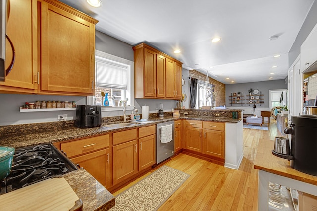 4825 N Karlov Ave, Chicago, IL 60630 - kitchen with stainless steel dishwasher, a peninsula, light wood-style floors, brown cabinets, and recessed lighting