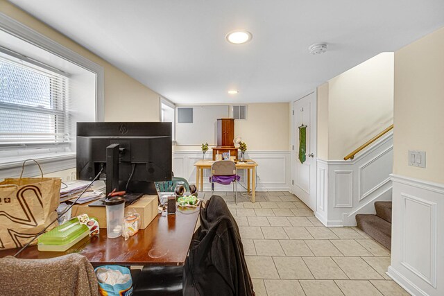 4825 N Karlov Ave, Chicago, IL 60630 - dining space featuring light tile patterned floors, wainscoting, stairway, and recessed lighting