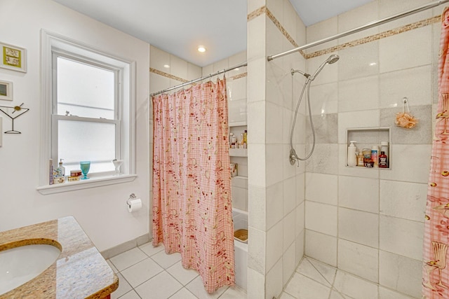 4825 N Karlov Ave, Chicago, IL 60630 - bathroom with healthy amount of natural light, vanity, shower / bath combo with shower curtain, and tile patterned flooring