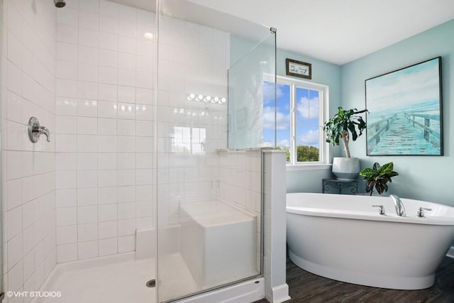 26930 Thornwood Blvd, Plainfield, IL 60585 - bathroom featuring a stall shower, wood finished floors, and a soaking tub