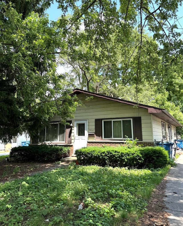 3437 Wallace Ave, Steger, IL 60475 - bungalow-style home featuring brick siding and asphalt driveway