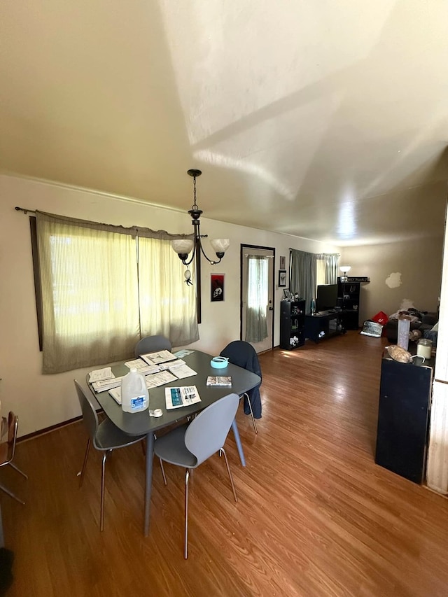 3437 Wallace Ave, Steger, IL 60475 - dining room with wood finished floors, a desk, and a chandelier