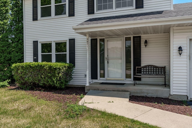 5971 Whispering Way, Loves Park, IL 61111 - doorway to property with covered porch and a shingled roof