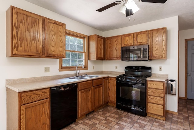 5971 Whispering Way, Loves Park, IL 61111 - kitchen featuring black appliances, brown cabinets, and brick patterned flooring