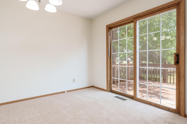 5971 Whispering Way, Loves Park, IL 61111 - carpeted empty room with a chandelier and baseboards
