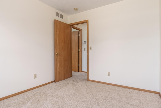 5971 Whispering Way, Loves Park, IL 61111 - spare room featuring carpet floors and a smoke detector