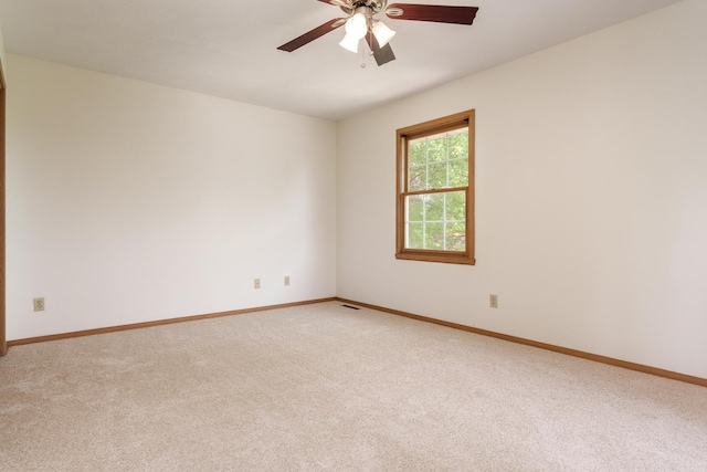 5971 Whispering Way, Loves Park, IL 61111 - spare room with light colored carpet and a ceiling fan