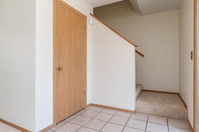 5971 Whispering Way, Loves Park, IL 61111 - stairway with carpet flooring and tile patterned floors