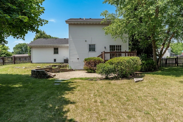 5971 Whispering Way, Loves Park, IL 61111 - back of property with a fenced backyard and a wooden deck