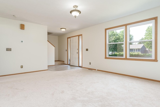 5971 Whispering Way, Loves Park, IL 61111 - empty room with light colored carpet and stairs
