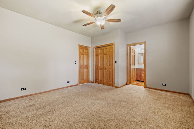 26050 S Locust Pl, Monee, IL 60449 - unfurnished bedroom featuring light colored carpet, ensuite bath, and a ceiling fan