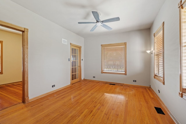 26050 S Locust Pl, Monee, IL 60449 - spare room with light wood-type flooring and a ceiling fan