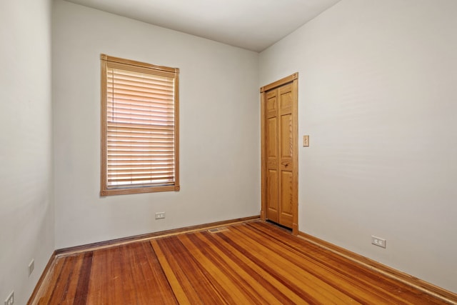 26050 S Locust Pl, Monee, IL 60449 - spare room with wood finished floors and baseboards