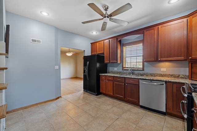 26050 S Locust Pl, Monee, IL 60449 - kitchen with stainless steel appliances, ceiling fan, light stone countertops, recessed lighting, and light tile patterned floors