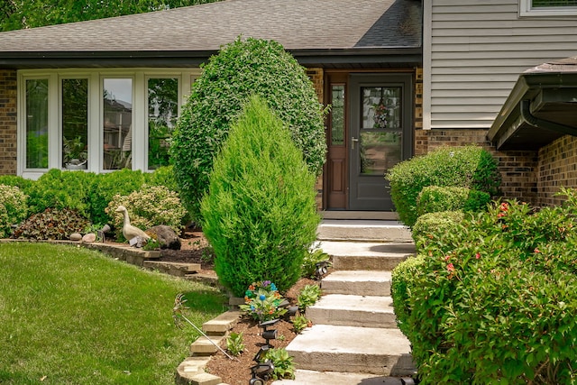 9S339 Cumnor Rd, Downers Grove, IL 60516 - property entrance featuring roof with shingles and brick siding