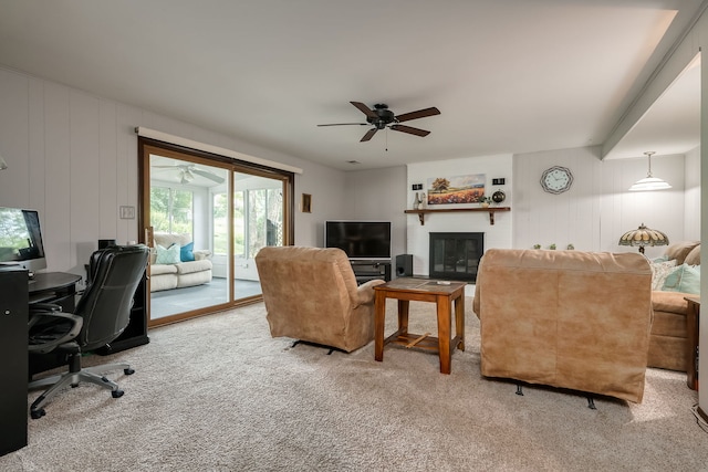 9S339 Cumnor Rd, Downers Grove, IL 60516 - living area with ceiling fan, light carpet, a desk, a glass covered fireplace, and a decorative wall