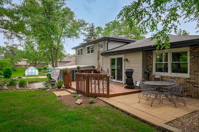 9S339 Cumnor Rd, Downers Grove, IL 60516 - rear view of house featuring a storage unit, a yard, a deck, a chimney, and a patio