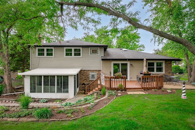 9S339 Cumnor Rd, Downers Grove, IL 60516 - rear view of house with a sunroom, a wooden deck, brick siding, and a lawn