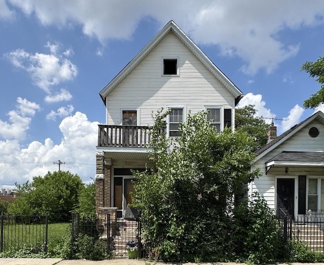 4022 W Carroll Ave, Chicago, IL 60624 - view of front facade featuring a balcony