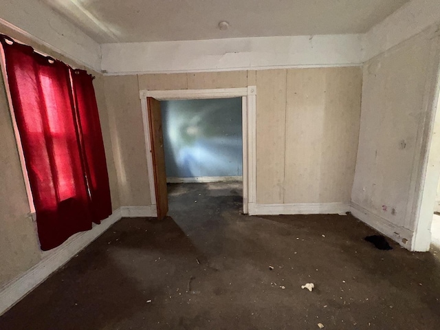 4022 W Carroll Ave, Chicago, IL 60624 - unfurnished room featuring unfinished concrete floors and baseboards