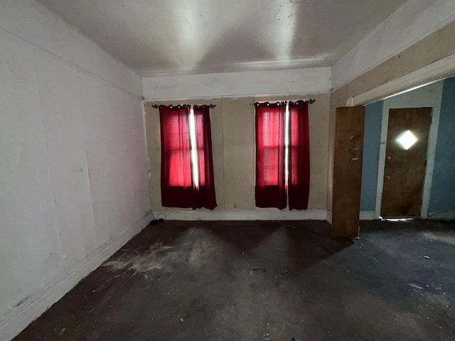 4022 W Carroll Ave, Chicago, IL 60624 - spare room featuring unfinished concrete flooring
