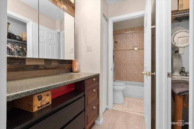 1703 Lakecliffe Dr Unit D, Wheaton, IL 60189 - bathroom featuring vanity, shower / washtub combination, and tile patterned flooring