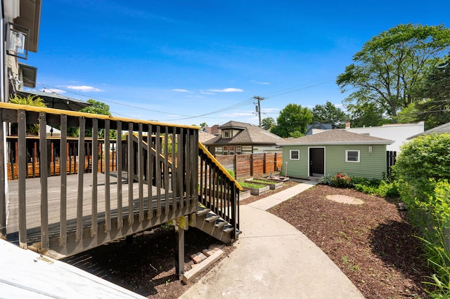 638 S Cuyler Ave, Oak Park, IL 60304 - view of yard with an outbuilding and a wooden deck