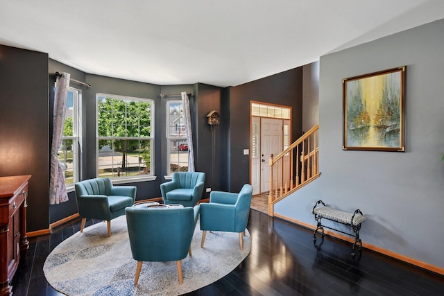 2590 Hennig Rd, Hampshire, IL 60140 - sitting room featuring dark wood finished floors and stairs