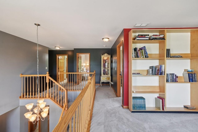 2590 Hennig Rd, Hampshire, IL 60140 - corridor featuring an upstairs landing, carpet, and a chandelier
