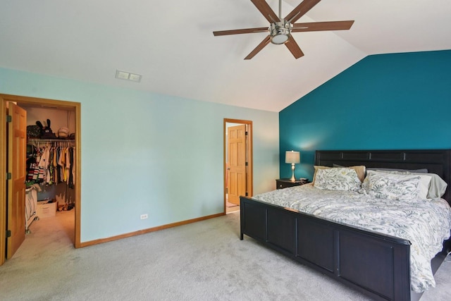 2590 Hennig Rd, Hampshire, IL 60140 - bedroom featuring vaulted ceiling, light colored carpet, a spacious closet, a ceiling fan, and a closet