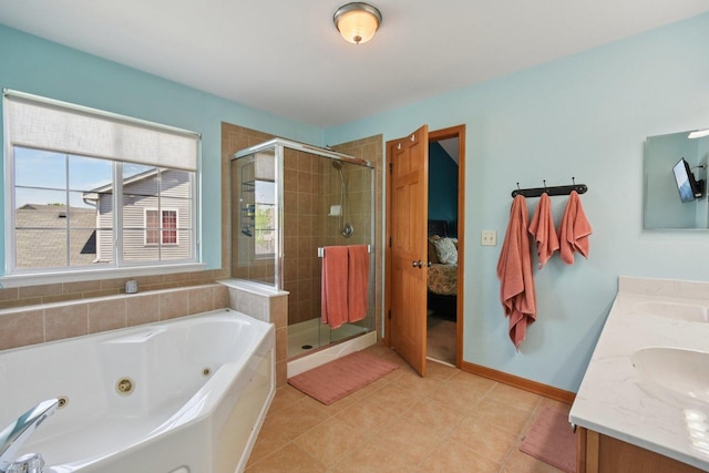 2590 Hennig Rd, Hampshire, IL 60140 - full bathroom with a jetted tub, a stall shower, double vanity, tile patterned flooring, and connected bathroom
