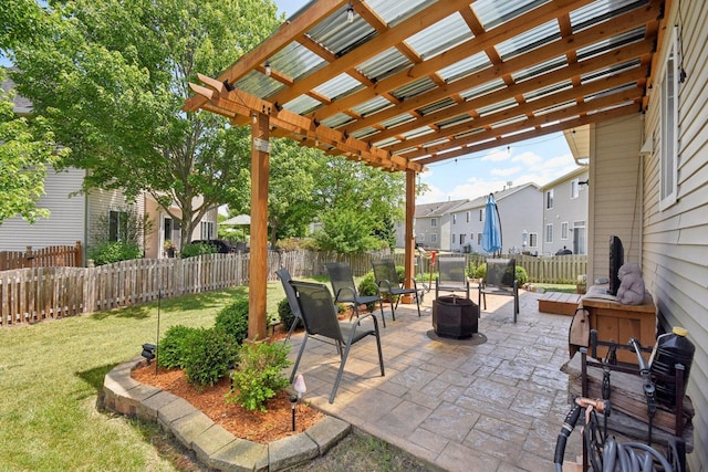 2590 Hennig Rd, Hampshire, IL 60140 - fenced backyard with an outdoor fire pit, a pergola, a patio area, and a residential view