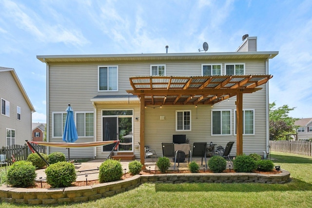 2590 Hennig Rd, Hampshire, IL 60140 - back of house featuring a patio area, a pergola, and a chimney