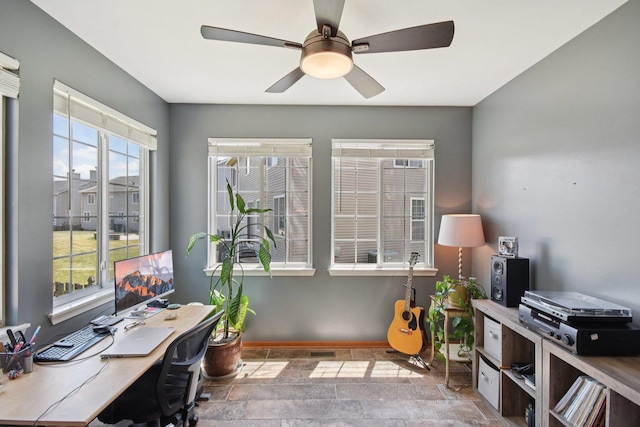 2590 Hennig Rd, Hampshire, IL 60140 - office featuring stone finish flooring and ceiling fan