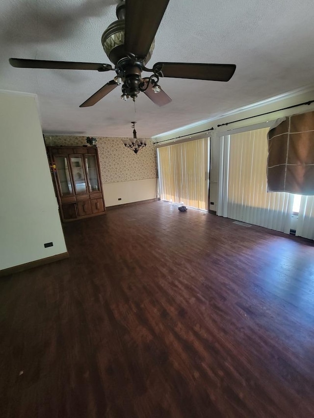 569 Lakewood Blvd, Park Forest, IL 60466 - unfurnished living room featuring wallpapered walls, a ceiling fan, and wood finished floors