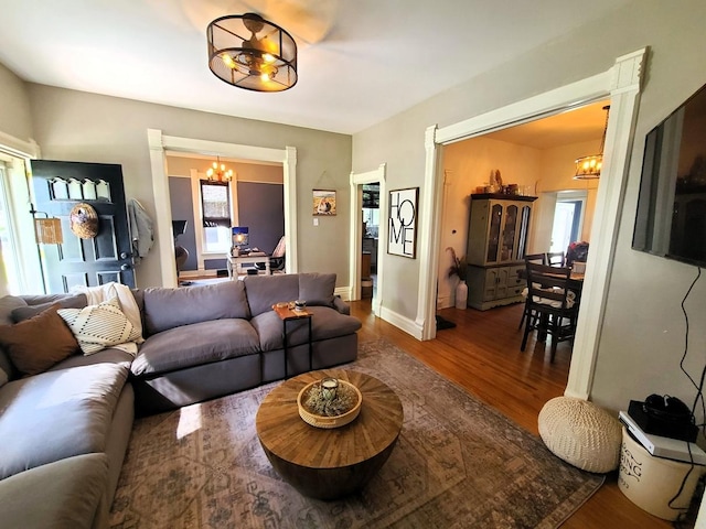 313 S 4th St, Oregon, IL 61061 - living area with a chandelier and wood finished floors
