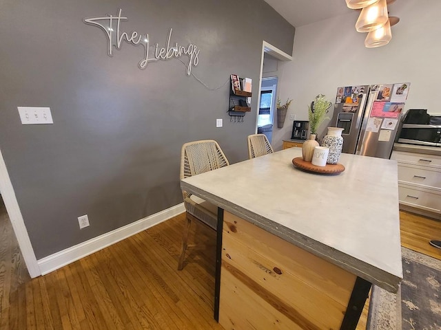 313 S 4th St, Oregon, IL 61061 - dining area featuring wood finished floors and an office area