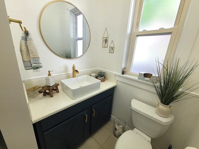 313 S 4th St, Oregon, IL 61061 - half bathroom with vanity and tile patterned flooring