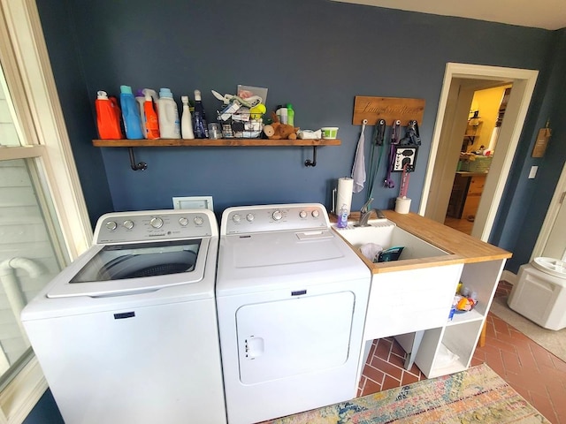 313 S 4th St, Oregon, IL 61061 - washroom with washing machine and clothes dryer and brick floors