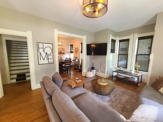 313 S 4th St, Oregon, IL 61061 - living room with wood finished floors and stairway