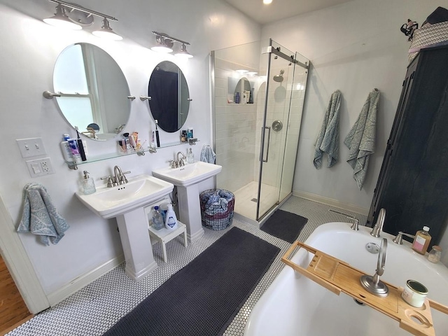 313 S 4th St, Oregon, IL 61061 - full bathroom featuring a stall shower and a tub to relax in